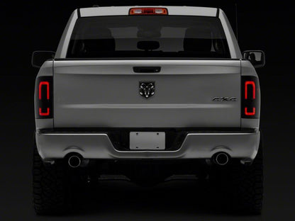 Raxiom 09-18 Dodge RAM 1500/2500/3500 Axial Series LED Tail Lights- Black Housing (Smoked Lens)