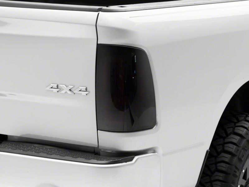 Raxiom 09-18 Dodge RAM 1500/2500/3500 Axial Series LED Tail Lights- Black Housing (Smoked Lens)