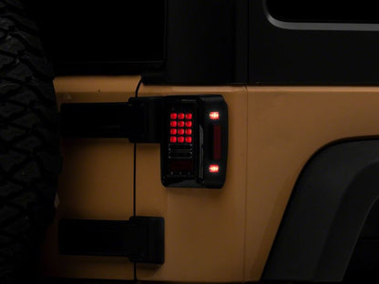Raxiom 07-18 Jeep Wrangler JK Axial Series LED Tail Lights- Black Housing (Clear Lens)